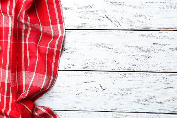 istock Napkin on white wooden background 524551664