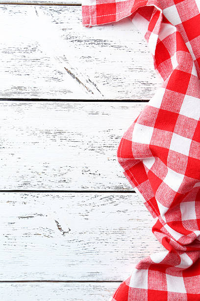 istock Napkin on white wooden background 524551846