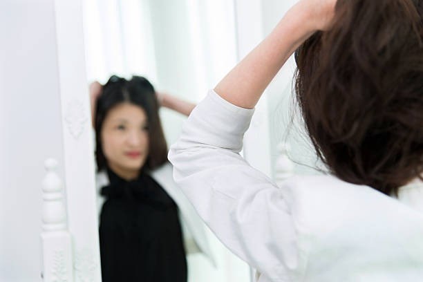 istock Tired businesswoman looking at herself 524552754