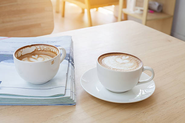 istock Latte Coffee art on the wooden table 524554154