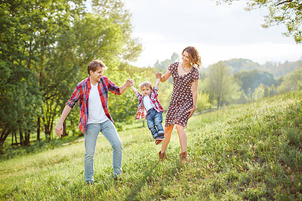 istock Happy Family Playing on the Nature 524554716