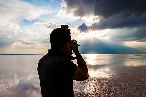 istock Man Photographing at Sunset 524576253