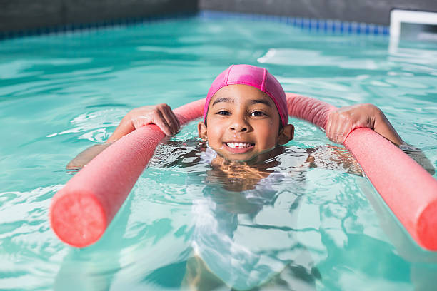 istock Cute kid swimming in the pool 524576619