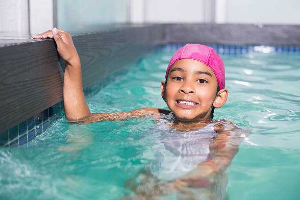 istock Cute kid swimming in the pool 524576621