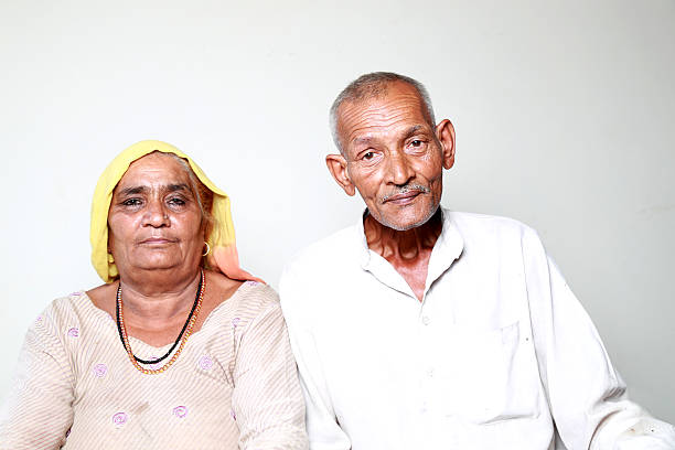 Indian Family Portrait Indian old couple portrait with studio lights grandmother real people front view head and shoulders stock pictures, royalty-free photos & images