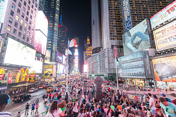 istock Times Square crowded of tourists at night. 524577295