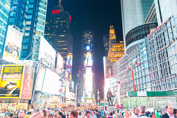 istock Times Square crowded of tourists at night. 524577549