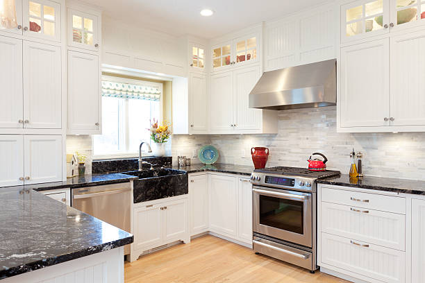 istock Contemporary Classic Home Kitchen Design Featuring Granite Countertops, White Cabinets 524578775