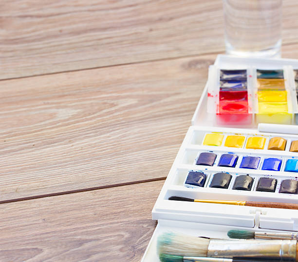 istock set of watercolor paints with brushes 524580621
