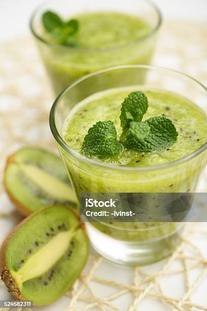 Kiwi Fruit Smoothie Stock Photo - Download Image Now - Close-up, Cross Section, Cup