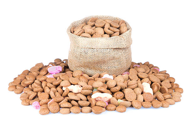 istock Jute bag filled with ginger nuts isolated over white 524583157
