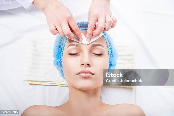 Skin Care Woman Cleaning Face By Beautician Stock Photo - Download Image Now - Adult, Applying, Beautician