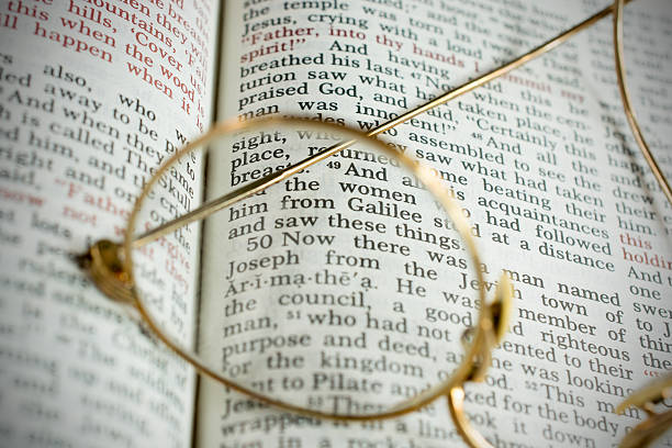 istock Antique Bible and Glasses 524619549