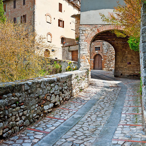 Narrow Alley with Old Buildings in the Italian City of Todi