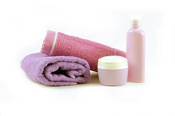 istock Towels and containers of creams, spa concept 524619943