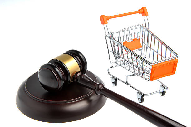 istock Gavel of judge with pushcart isolated on white 524622029