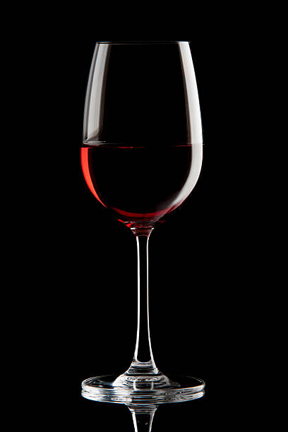 istock red wine in a glass 524622649