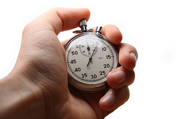 istock Male hand holding stopwatch 524622747