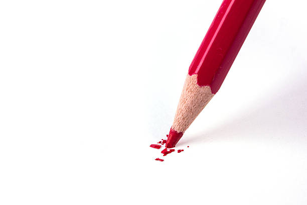 istock close up of red color pencil head break 524650141