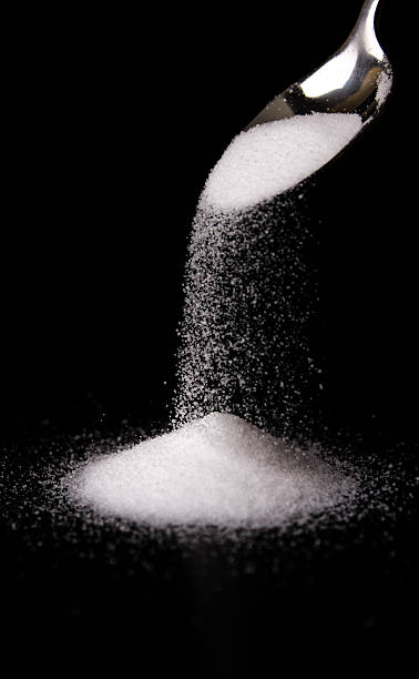 istock Spoon with Pile of Salt 524650203