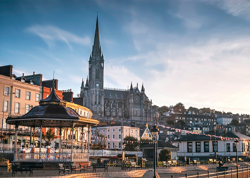 A view of St Colman's Cathedral from the promenade in the picturesque town of Cobh, Co. Cork, Ireland.