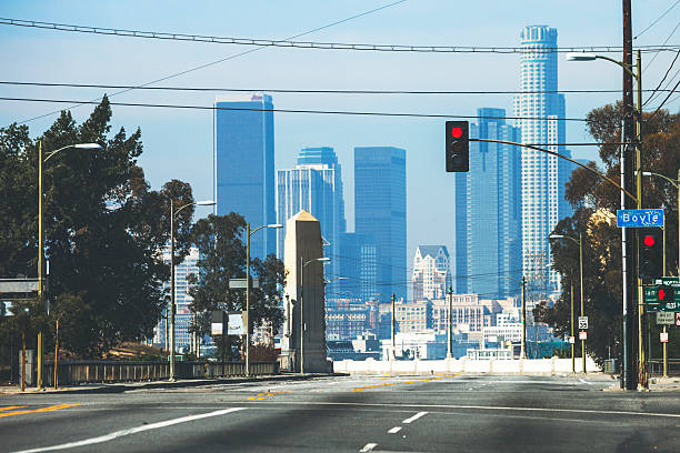 Deserted streets of East LA, downtown in background.