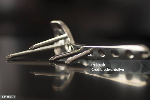 Traumatology Orthopedic Surgery Implant Plate And Screws Stock Photo - Download Image Now