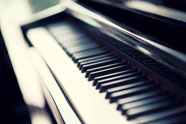 istock Close-up of a Black Grand Piano Keyboard 524653801