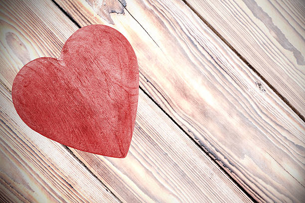 istock Wooden red heart on timbered background, space for text. 524656441