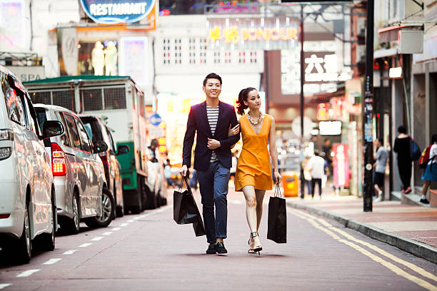 Couple Shopping Couple shopping in Hong Kong shopping asia stock pictures, royalty-free photos & images