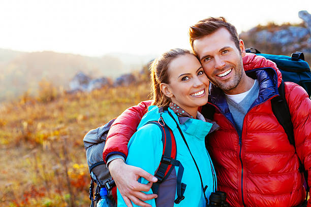 istock Young couple in mountains smiling 524687779