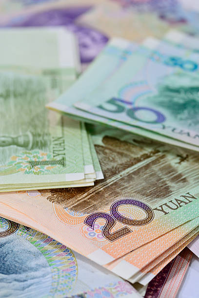 istock chinese Yuan banknotes (renminbi)  for money and business  conce 524688829