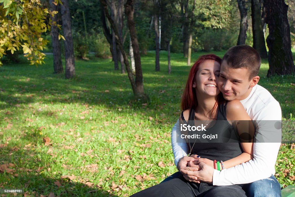 Love Young couple exchange tenderness and enjoying in closeness on nice summer day 20-29 Years Stock Photo