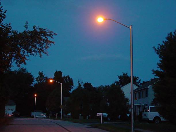 istock Suburban Street at dusk 524691233