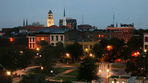 istock Savannah Evening Twilight Skyscape with Lights and Steeples 524692203
