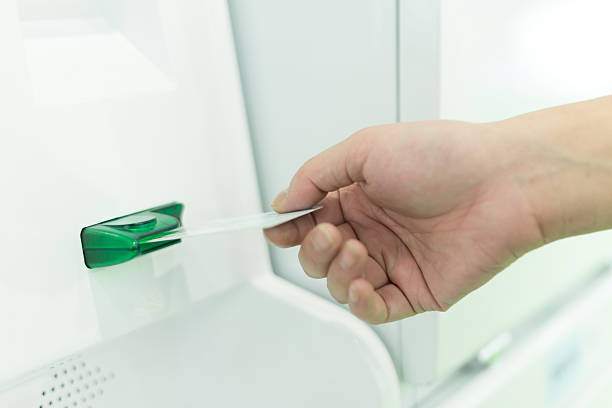istock hand out the digital card to scan in device 524693869
