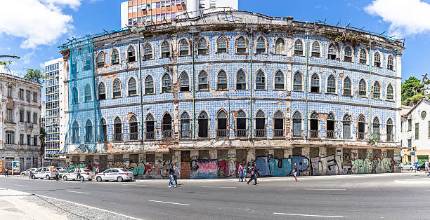 Salvador, Brazil - February 1, 2016: Typical Brazilina architecture in downtown Salvador. This building is on the coast in the Bahia city of Salvador, Pedestrians are pictured