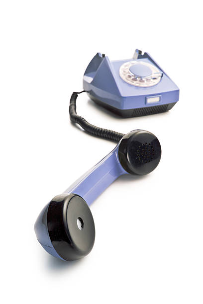 istock old telephone with lifted handset 524697740