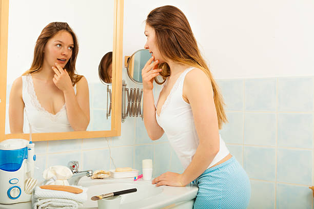 istock Woman without makeup in bathroom. 524697928