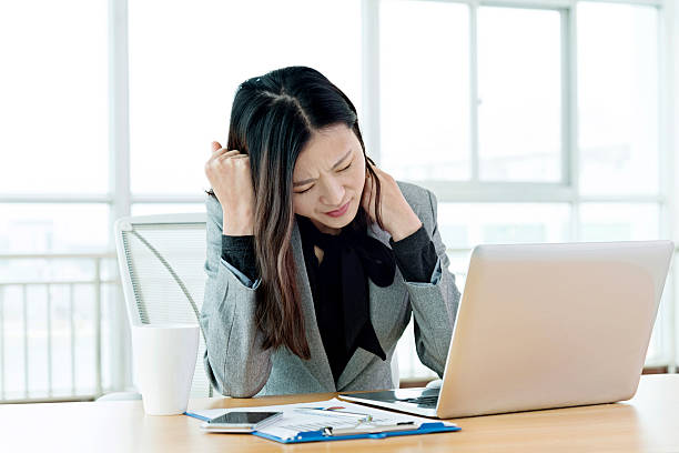 istock Stressed businesswoman in office 524698830