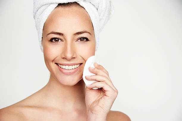 istock Young brunette beauty treatment smiling at camera 524699084