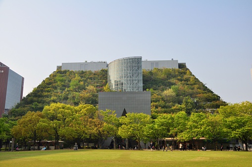 Fukuoka, Japan - April 10, 2014: Front view of ACROS Fukuoka Prefectural International Hall in Fukuoka, Kyushu, Japan. 