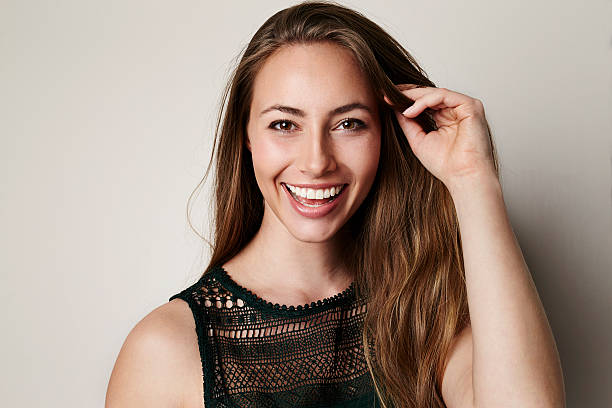 istock Gorgeous smiling young woman in studio, portrait 524700216