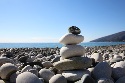 Balance pebbles on a beach. Harmony, Teamwork or Meditation.
