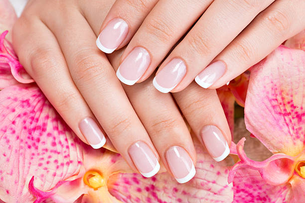 istock Beautiful woman's nails with french manicure 524700520