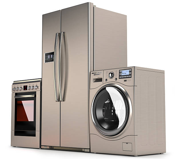 istock Home appliances, refrigerator, washing machine and a gas stove 524700694