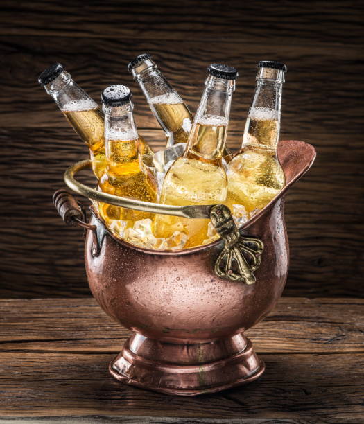 istock Cold bottles of beer in the brazen bucket. 524701188