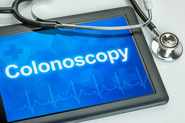 Tablet with the text Colonoscopy on the display stock photo