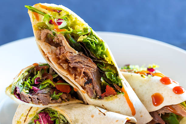 istock Close up of spicy mexican meat wrap. 524702948