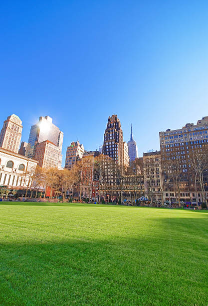 istock Green Lawn and Skyline with Skyscrapers in Bryant Park 524704570